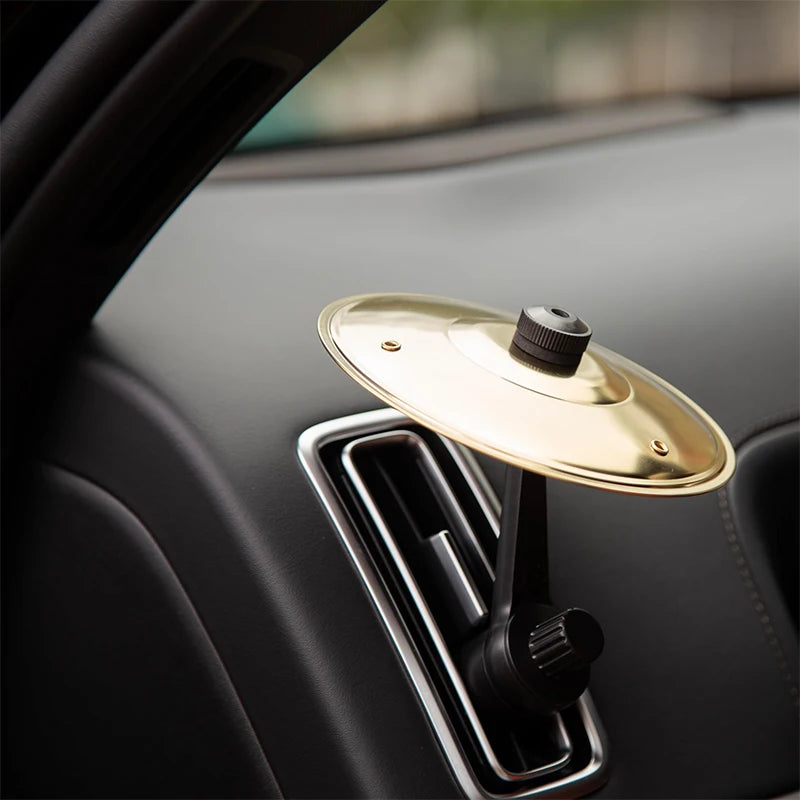 Clip it onto your car's air vent.
